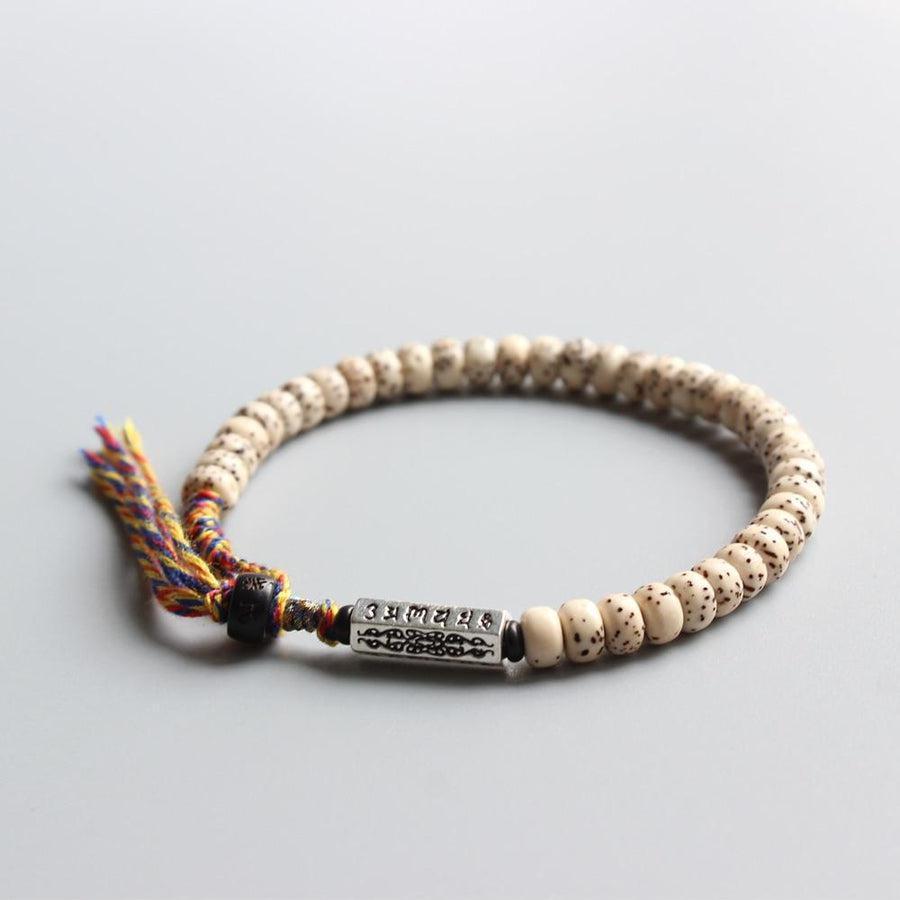 Bracelet complet en graines de Bodhi avec détails des gravures