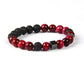 Bracelet en pierres de lave et hématite sur fond blanc