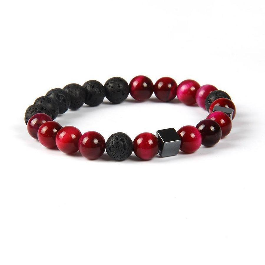 Bracelet en pierres de lave et hématite sur fond blanc