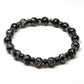 Détail des perles d'onyx noir et hématite