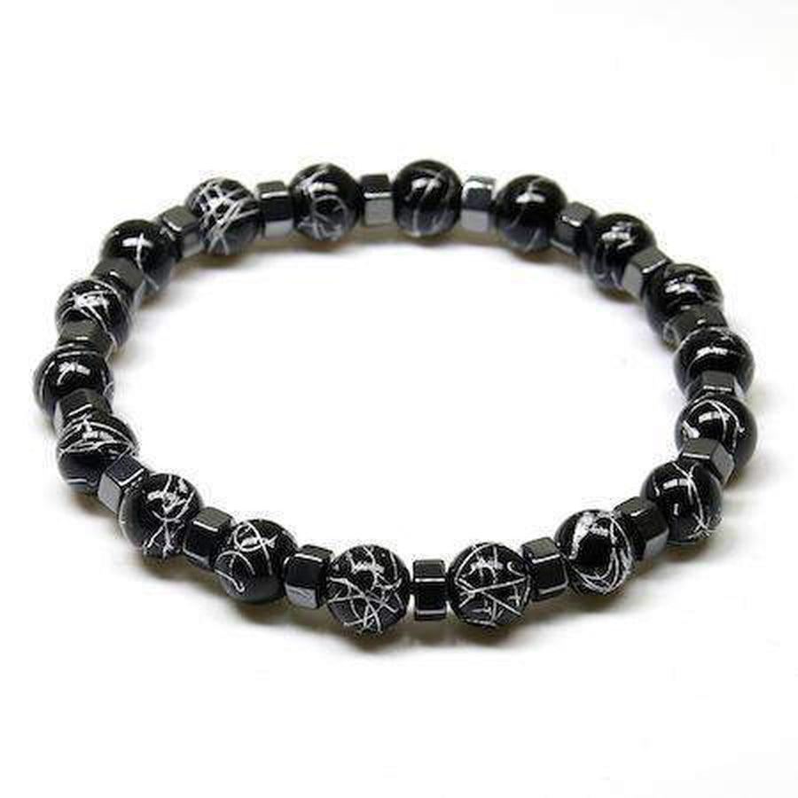 Détail des perles d'onyx noir et hématite
