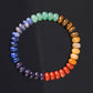 Bracelet 7 chakras avec perles colorées et dorées
