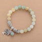 Bracelet en amazonite et pampille arbre de vie sur fond neutre