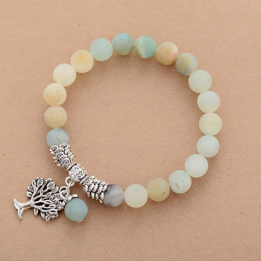 Bracelet en amazonite et pampille arbre de vie sur fond neutre