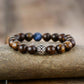 Bracelet en bronzite tibétaine avec pierres rondes de 10 mm