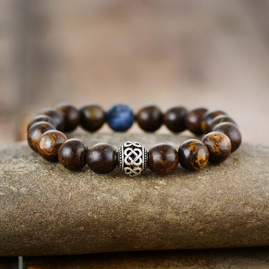 Bracelet en bronzite tibétaine avec pierres rondes de 10 mm