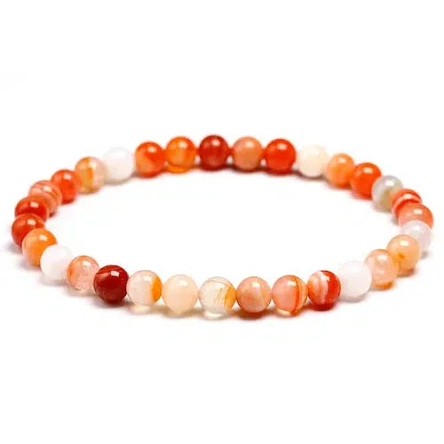 Bracelet en cornaline avec reflets brillants, élastique visible