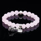 Bracelet en cristal rose et pendentifs argent tibétain
