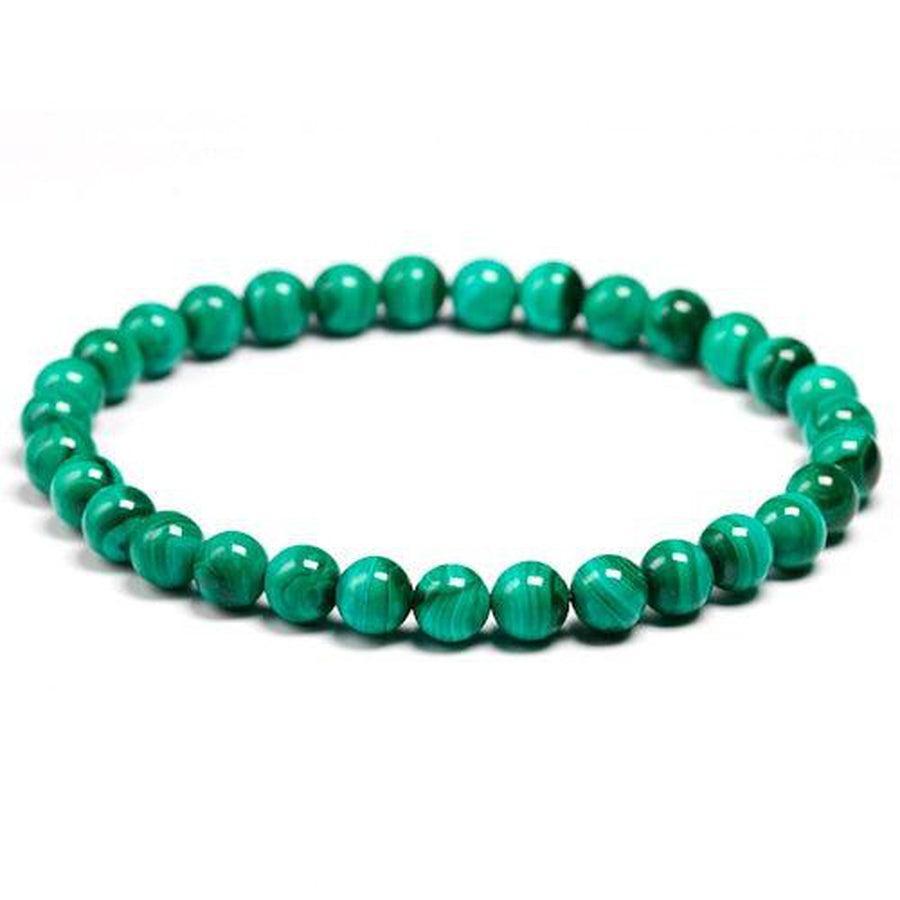 Bracelet en malachite porté sur un poignet