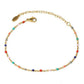 Détail de la médaille sur la chaînette du bracelet