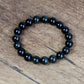Bracelet obsidienne noire enroulé, vue latérale détaillée