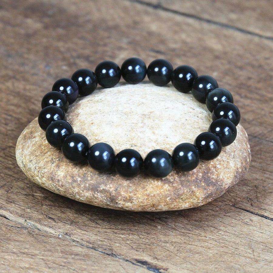 Vue rapprochée du bracelet obsidienne noire, perles uniformes
