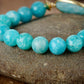 Perles d'Amazonite alignées, couleur bleu hypnotique