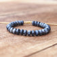 Bracelet en labradorite avec perles disque sur cordon beige