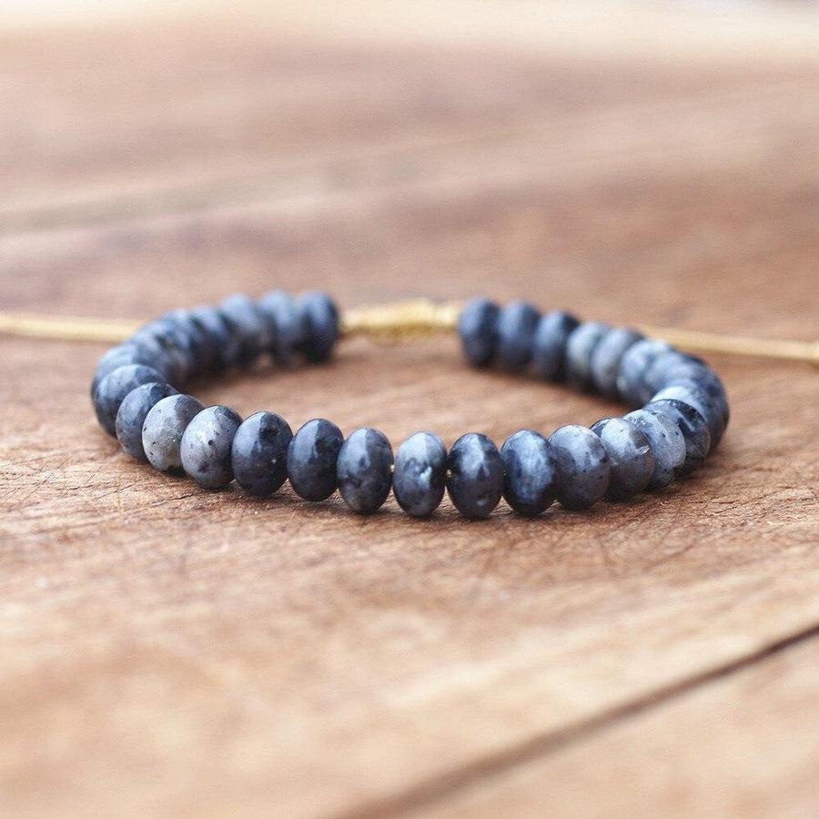 Bracelet en labradorite avec perles disque sur cordon beige