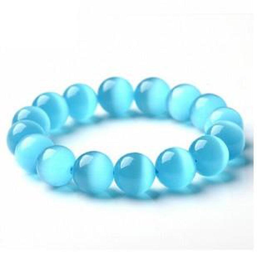 Bracelet opalite bleue posé sur une surface claire