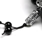 Détail du fermoir coulissant du bracelet en obsidienne