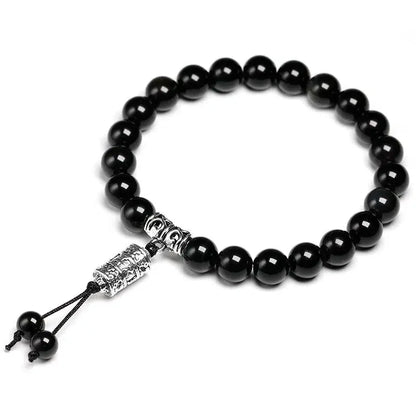 Vue d'ensemble du bracelet obsidienne noire avec breloque Om