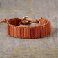 Bracelet en cuir avec pierres de sable et arbre de vie gravé