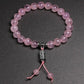 Détail du fermoir à bascule du bracelet rose