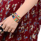 Bracelet énergétique avec perles représentant les 7 chakras