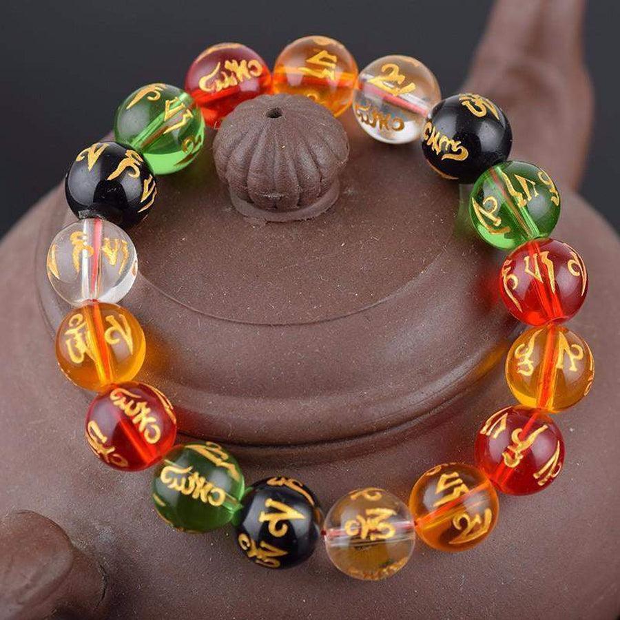 Bracelet en perles de verre multicolores avec mantra gravé