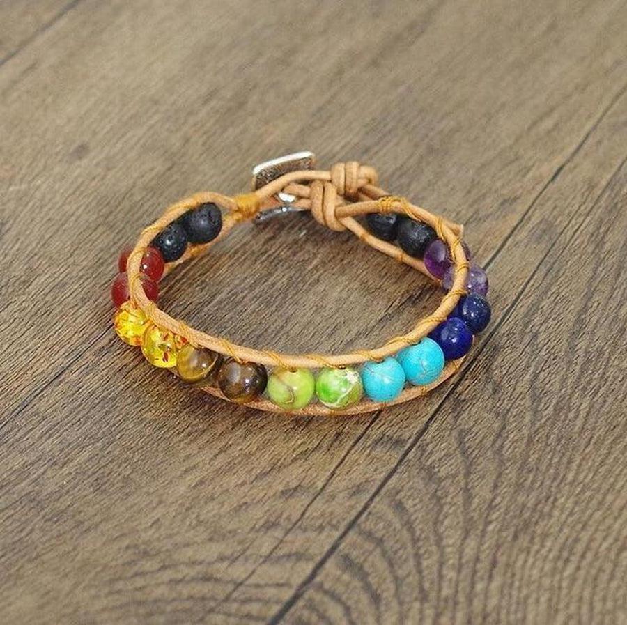 Détail des perles chakras sur cordon double