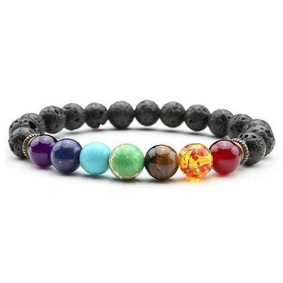 Bracelet en pierres naturelles posé sur une surface claire
