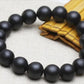 Bracelet Bianshi posé sur une surface en bois clair