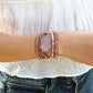 Ensemble de cinq brins de perles multicolores polies