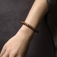Vue latérale du bracelet extensible en cuivre poli