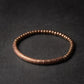 Bracelet en cuivre avec perle centrale martelée
