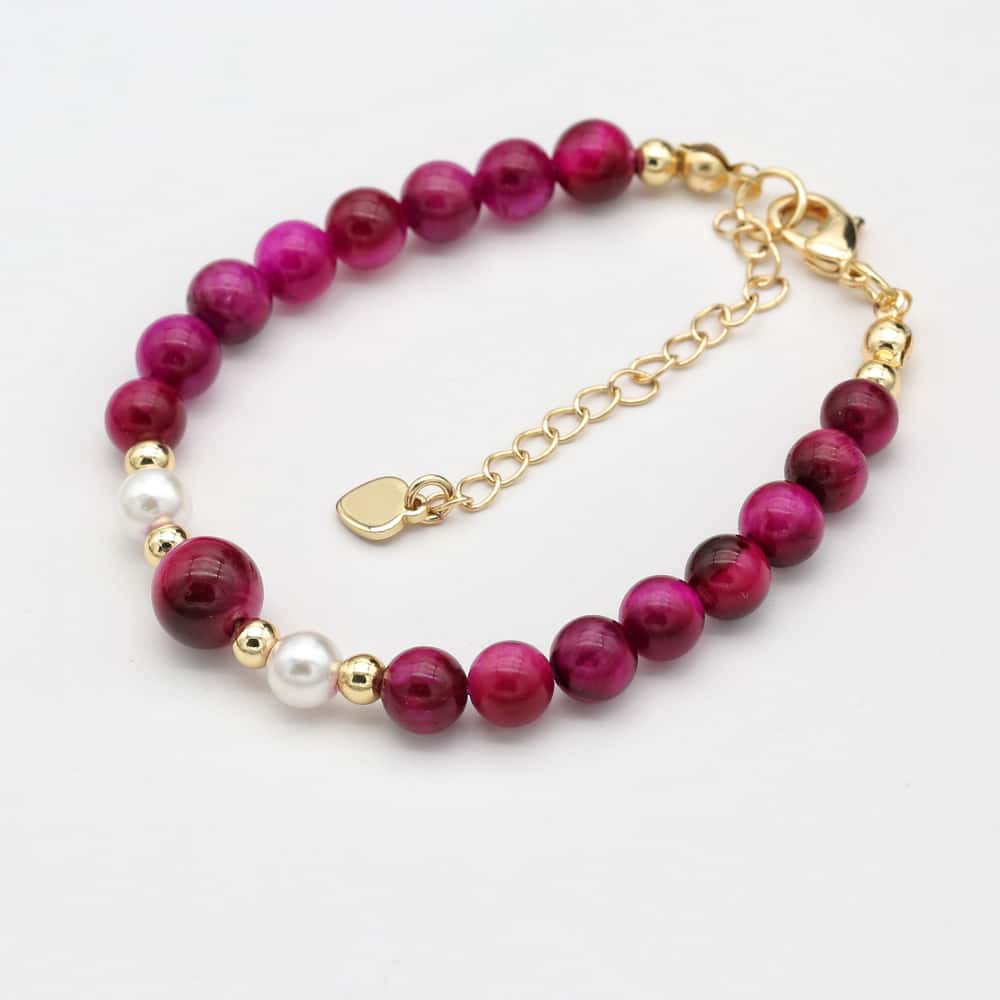 Vue latérale du bracelet avec chaînette ajustable en or