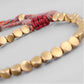 Bracelet en cuivre avec cordon beige