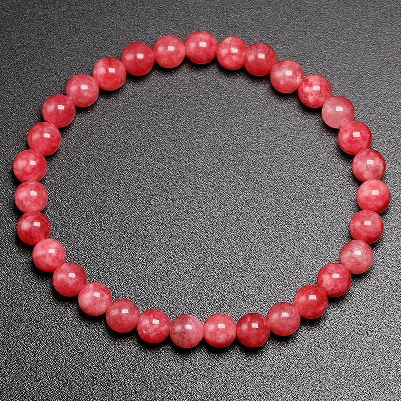 Bracelet en rhodonite entouré de pierres naturelles assorties