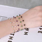 Bracelet en acier inoxydable avec perles naturelles colorées
