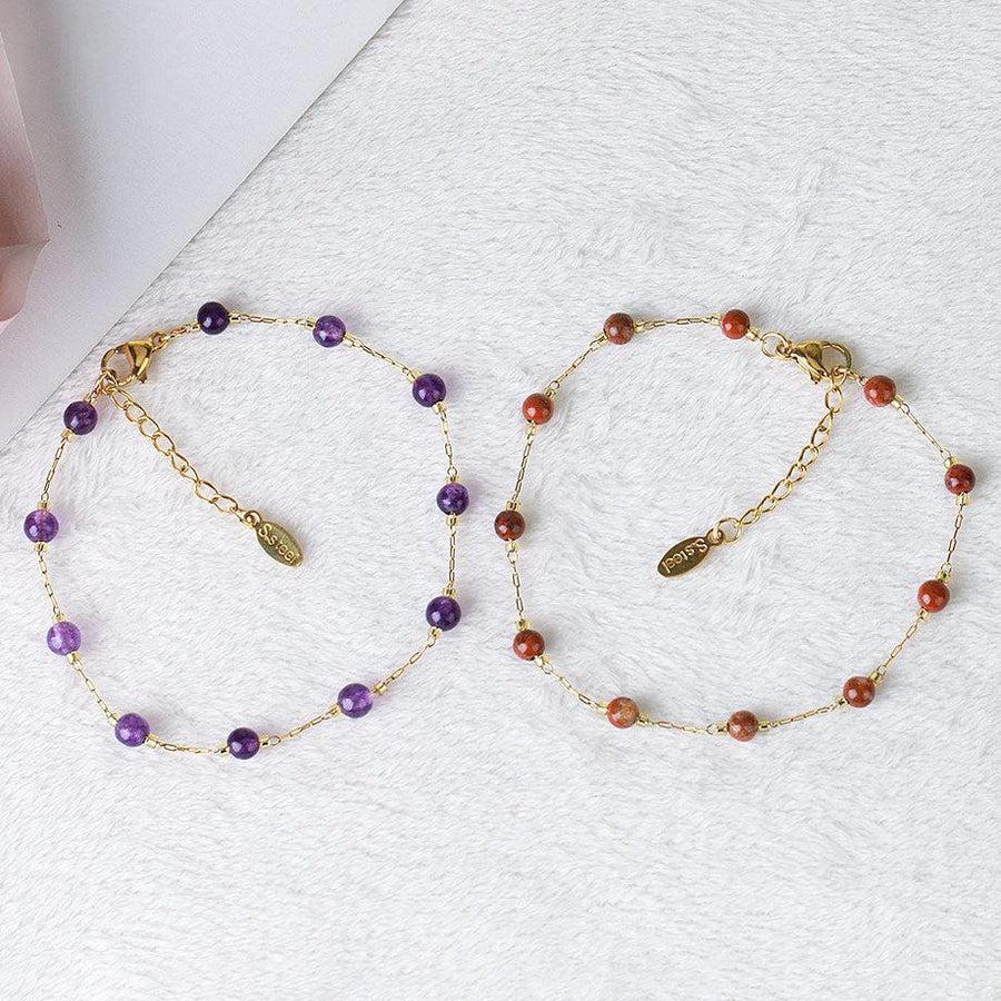Bracelet affichant des perles d'améthyste et d'obsidienne