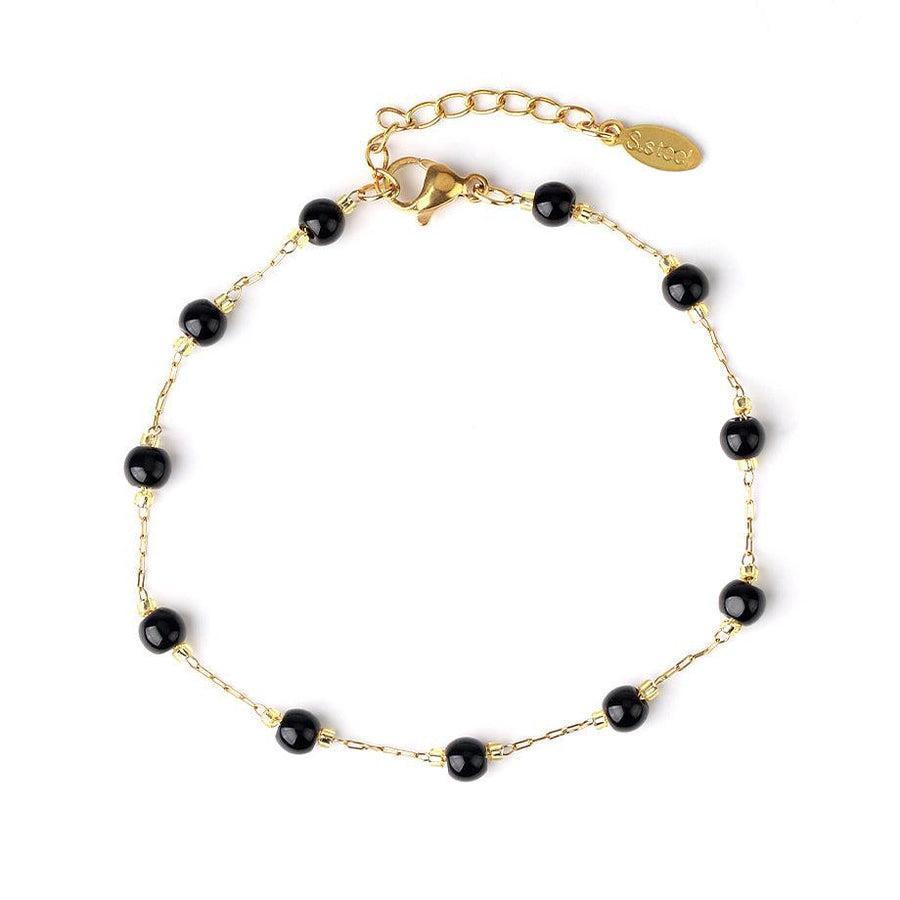 Bracelet en acier avec perles de jasper rouge distinctives