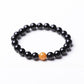 Bracelet en onyx noir avec perle pailletée en gros plan