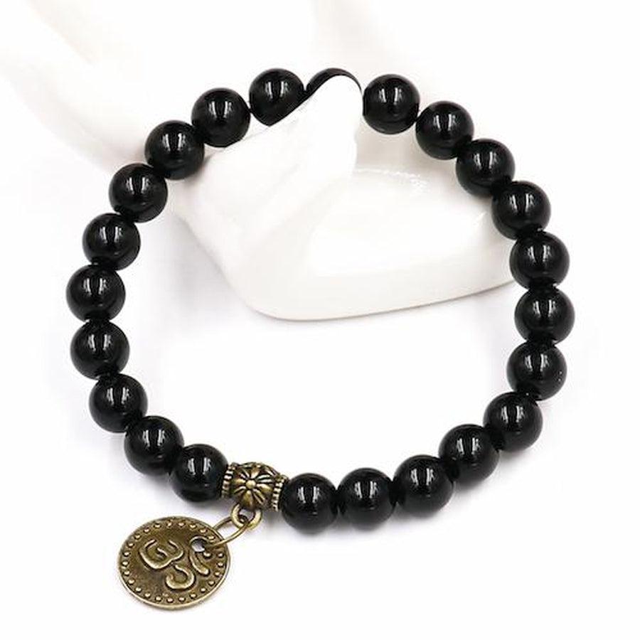 Détail des perles en onyx noir lustrées