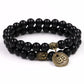 Gros plan sur le charme Bouddha du bracelet