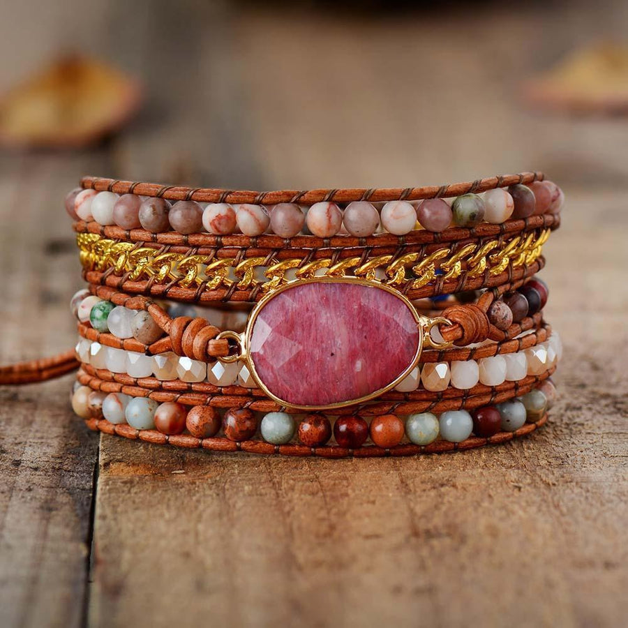 Pierre centrale de Rhodonite sur bracelet ajustable