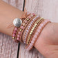 Vue latérale du bracelet en cuir et Quartz rose