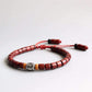 Bracelet mantra en bois d'olivier rouge poncé