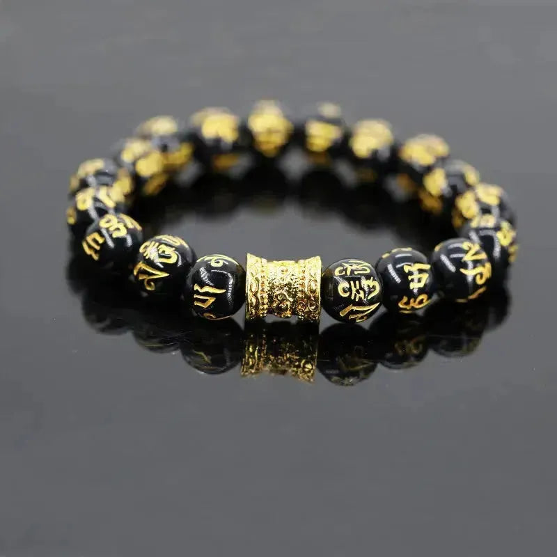Bracelet en onyx avec mantra tibétain gravé