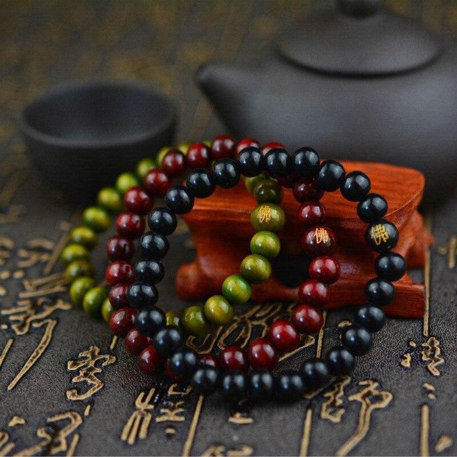 Bracelet en bois de santal avec perles sculptées à la main
