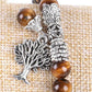 Détail du pendentif Arbre de vie sur le bracelet protecteur