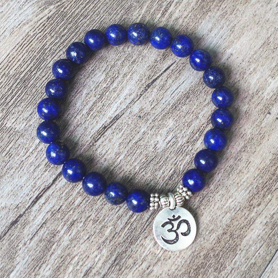Bracelet en lapis-lazuli avec pendentif Om gravé