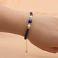 Bracelet en perles naturelles avec chaînette dorée ajustable