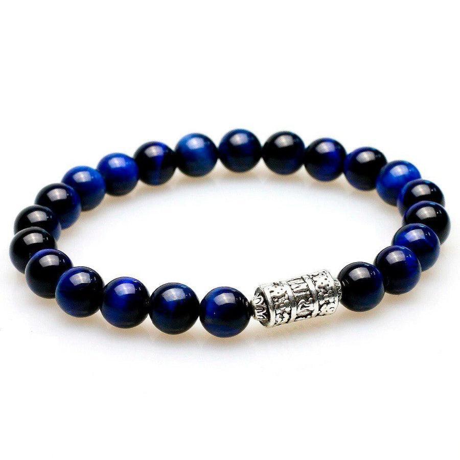 Bracelet avec perles bleues et totem, vue de dessus